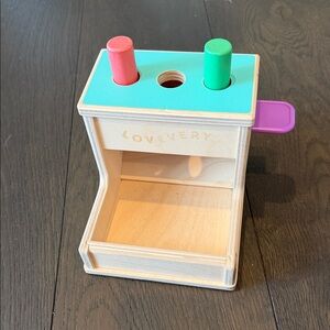 Lovevery Wooden Toy with Red and Green Pegs